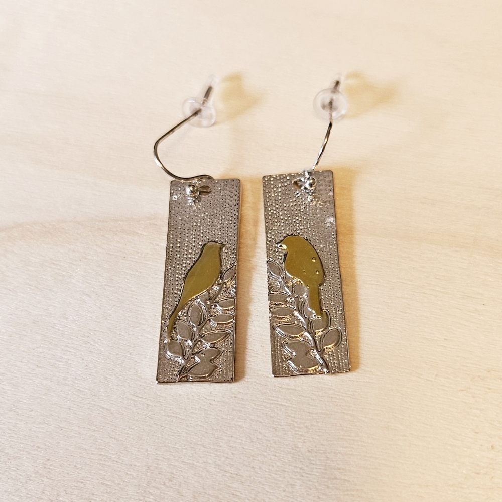 Silvery dangle earrings with golden bird earrings NWT